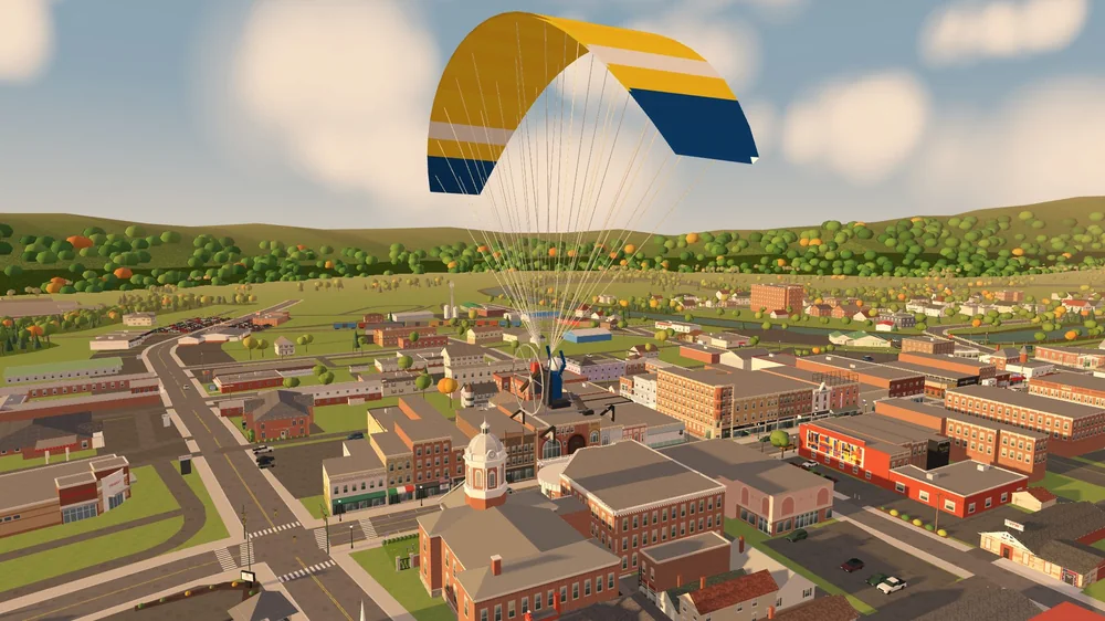 A gold and navy paraglider wing over the Upshur County Courthouse and Main Street at golden hour, in Skyward Buckhannon